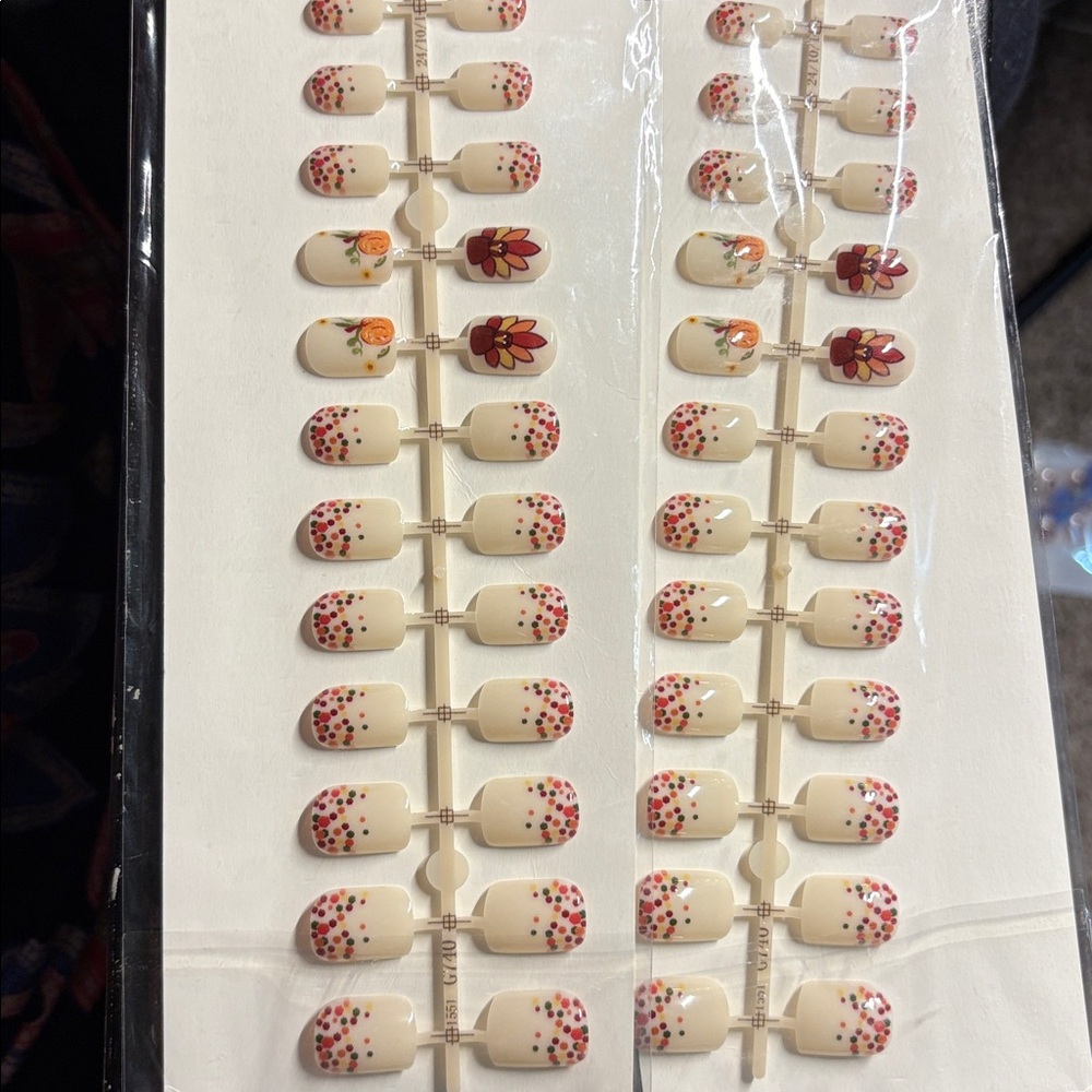 Two (2) Sets of Press on Nails Medium length